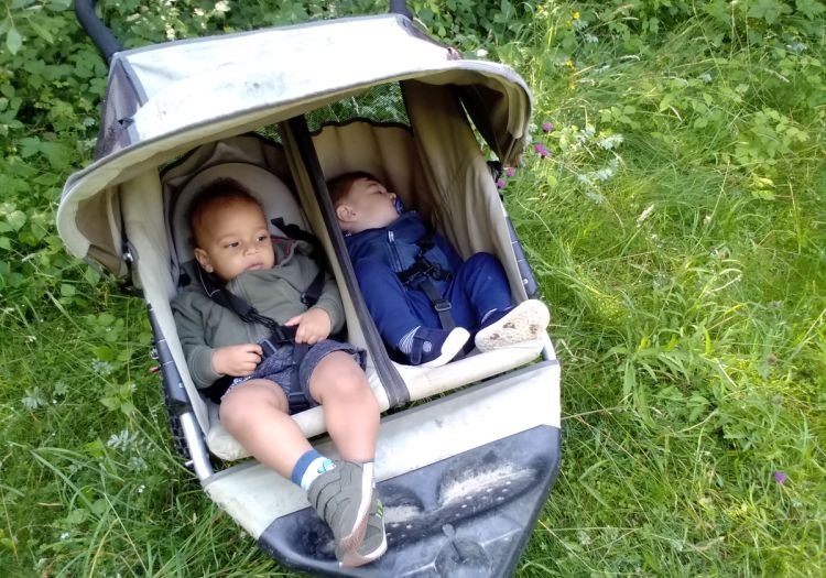Baby sleep on walk in woods